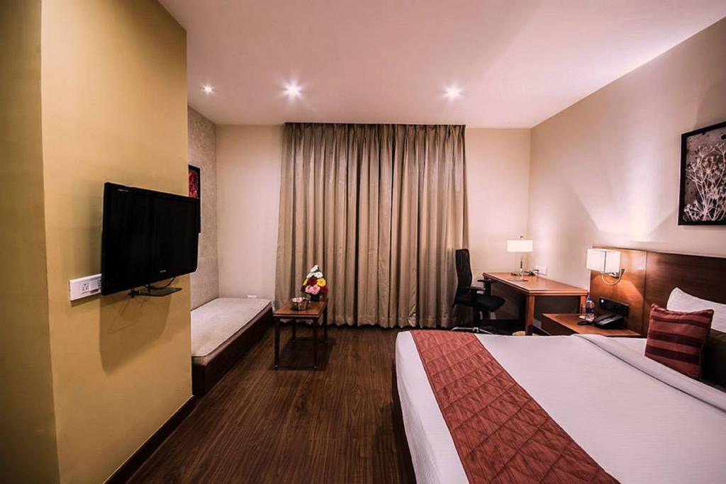 Siesta Hitech Hotel Hyderabad Værelse billede